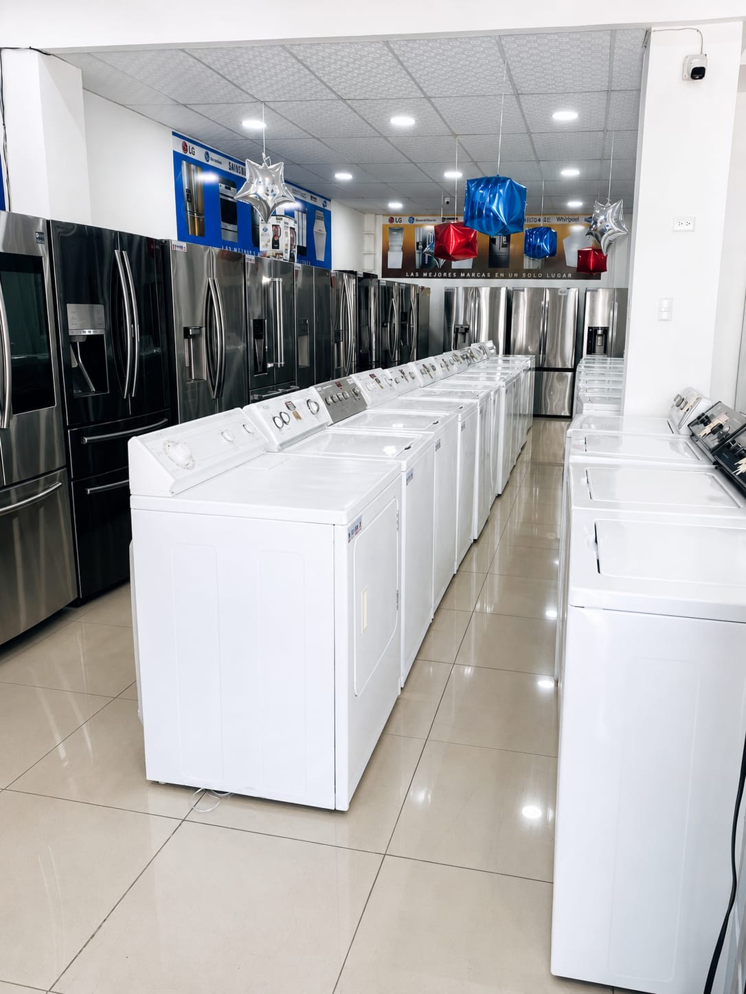 Showroom — pasillo principal — Electrodomésticos Rivera, San Pedro Sula